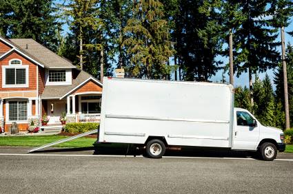 Movers in front of customer's District of Columbia home.